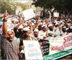  ?? RAJIB DHAR/AFP ?? The crackdown in Myanmar’s Rakhine state on Rohingya Muslims has also sparked protests in Muslim-majority countries overseas, such as Bangladesh (pictured) and Malaysia.