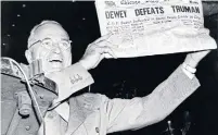  ?? UNDERWOOD ARCHIVES VIA GETTY IMAGES ?? Harry Truman holds up a copy of the Chicago Daily Tribune declaring his defeat to Thomas Dewey in 1948. Truman won.