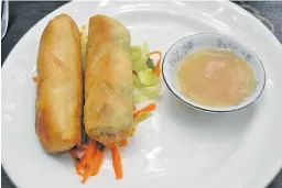  ?? Picture: BRYAN SMITH ?? BURST OF FLAVOUR: Sunday’s starter at Ruanthai restaurant – vegetable spring rolls with a homemade peanut sauce