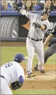  ?? MARK J. TERRILL - ASSOCIATED PRESS ?? The Giants’ Joe Panik lines the ball back at Dodgers starter Hyun-Jin Ryu.