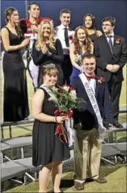  ?? PHOTO BY BRYAN FAGAN ?? Souderton Area High School Homecoming Queen Karly Ditlow and Homecoming King Kevin Lezynski stand with other Homecoming Court members.