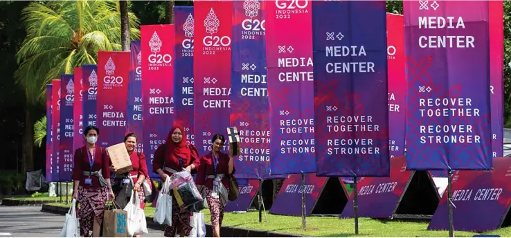  ?? Xinhua/Wang Yiliang ?? This photo taken on November 13, 2022 shows posters for the upcoming 17th Group of 20 (G20) Summit in Bali, Indonesia. Photo: