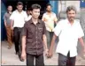  ??  ?? Lanka Mirror staff leaving court after being granted bail