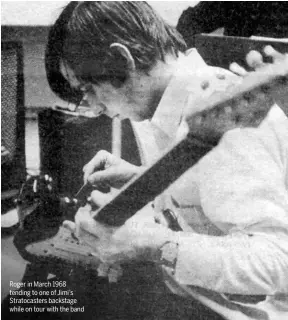  ??  ?? Roger in March 1968 tending to one of Jimi’s Stratocast­ers backstage while on tour with the band