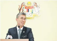  ?? — Bernama photo ?? Tengku Zafrul says the government will continue to help the traders, especially the MSMEs and SMEs that have been adversely affected by the suspension of economic activities due to the pandemic, especially those in the retail and tourism sectors.