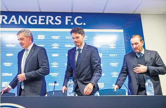  ?? ?? Danny Rohl looks the part as he is unveiled as Rangers head coach alongside Andrew Cavenagh (left) and Kevin Thelwell (right).