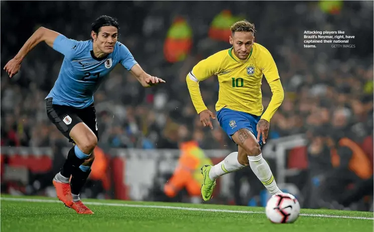  ?? GETTY IMAGES ?? Attacking players like Brazil’s Neymar, right, have captained their national teams.