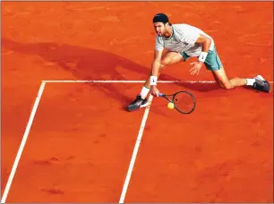  ?? — REUTERS ?? Russia’s Karen Khachanov in action during his round of 64 match against Britain’s Cameron Norrie.