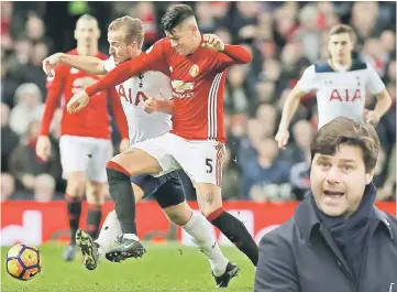  ??  ?? Manchester United’s Marcos Rojo in action with Tottenham’s Harry Kane during the English Premier League match at Old Trafford. — Reuters photo