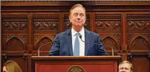  ?? Associated Press ?? Gov. Ned Lamont delivers the State of the State address during the opening session of the Legislatur­e last month.