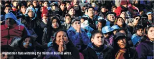  ??  ?? Argentinia­n fans watching the match in Buenos Aires..