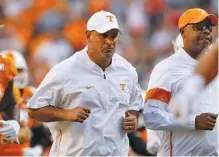  ?? STAFF FILE PHOTO BY C.B. SCHMELTER ?? Tennessee football coach Jeremy Pruitt’s second season continues with a stiff challenge as the Vols visit No. 1 Alabama tonight.