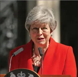  ??  ?? A tearful Theresa May announces her decision to quit after failing to secure Brexit