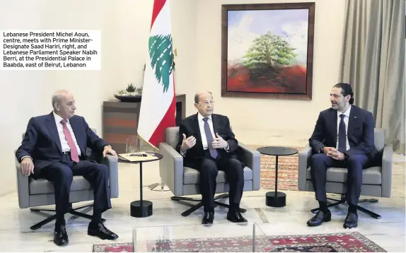  ??  ?? Lebanese President Michel Aoun, centre, meets with Prime MinisterDe­signate Saad Hariri, right, and Lebanese Parliament Speaker Nabih Berri, at the Presidenti­al Palace in Baabda, east of Beirut, Lebanon