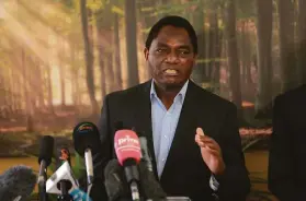  ?? Tsvangiray­i Mukwazhi / Associated Press ?? Hakainde Hichilema holds a press conference in Lusaka. He won more than half of the nearly 5 million votes cast in Zambia to win the presidency outright.