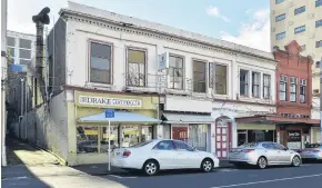  ?? PHOTOS: GERARD O’BRIEN ?? End of an era . . . The Rattray St buildings, formerly owned by Dunedin’s Chin family, have been sold.