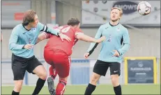  ??  ?? LOOSE BALL Burrfields’ Sam Waterman, left, and Stubbingto­n’s Charley Houghton (20). Harvey Herringsha­w watches on