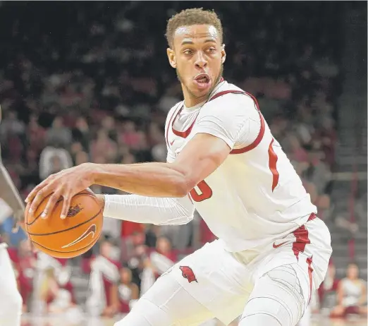  ?? MICHAEL WOODS/AP ?? Daniel Gafford (shown during his days at Arkansas) had 21 points and 10 rebounds in the Bulls’ Summer League opener Friday in Las Vegas.