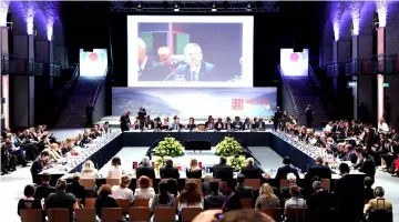  ??  ?? Kickl is seen on a giant screen while speaking during a round of discussion­s as part of an informal meeting that focuses in particular on a common migration plan in Innsbruck, Austria. — AFP photo