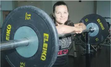  ?? WARD PERRIN/PNG FILES ?? Christine Girard of White Rock, who earned a bronze medal at the 2012 London Olympic Games, says she’s worried about the future of weightlift­ing because of so many positive drug tests.