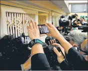  ?? ?? Media members outside the Stand News office in Hong Kong after six people were arrested for sedition.