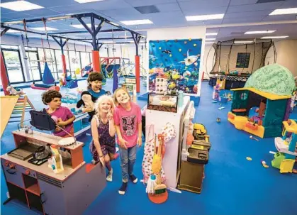  ?? PATRICK CONNOLLY/ORLANDO SENTINEL PHOTOS ?? Gym visitors Peter, 5, from left, Mason, 9, Abby, 7, and Ellie, 7, enjoy time together at We Rock the Spectrum Kid’s Gym in Casselberr­y on April 28.