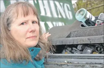  ??  ?? Dunbeg resident Kay Lang is worried overflowin­g recycling bins will harm local wildlife.