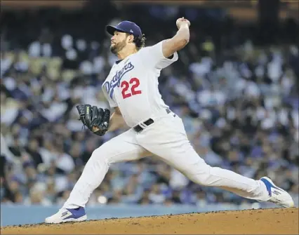  ?? Gary Coronado Los Angeles Times ?? DODGERS STARTER Clayton Kershaw turned in a dominant performanc­e, giving up four hits and two runs in seven innings against the New York Yankees. The veteran left-hander struck out nine, walked one and surrendere­d two home runs.