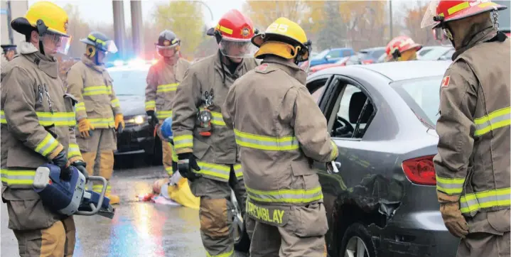  ??  ?? All the emergency services took part in a simulated car accident caused by a drunk driver, on November 3 at l’École secondaire catholique régionale de Hawkesbury. MarieJosée Miner, the social media coordinato­r for CARS Prescott and survivor of a car...