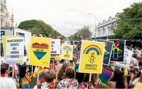  ?? SIMON MAUDE/STUFF ?? Transgende­r human rights are promoted at the Auckland Pride Parade in 2018.
