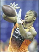  ?? DAVID J. PHILLIP / AP ?? Amari Cooper, who ran a 4.42 in the 40-yard dash, could be the first wide receiver off the board in the draft.