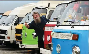  ?? Mike O’Neill in familiar pose with his beloved Volkswagen­s. Photo Domnick Walsh ??
