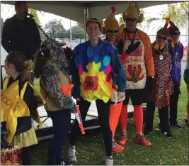  ??  ?? Solano Turkey Trot partipants line up for the best costume award Thursday morning at Solano College in Fairfield.