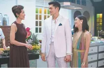  ?? Sanja Bucko, Warner Bros. Pictures ?? Michelle Yeoh, Henry Golding and Constance Wu in “Crazy Rich Asians.”