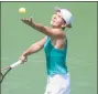  ?? John Minchillo / Associated Press ?? Simona Halep serves during the finals at the Western &amp; Southern Open tournament Sunday in Ohio.