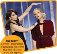  ?? — AP ?? Two funny: Fey (left) and Poehler entertaini­ng the crowd with their hilarious antics during the
awards.