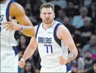  ?? Matt York The Associated Press ?? Dallas Mavericks guard Luka Doncic had 35 points and 10 rebounds in Game 7 despite not playing for most of the fourth quarter.