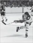  ??  ?? Darryl Sittler fires a slapshot at Boston goalie Dave Reece on his way to an NHL record 10-point night (six goals and four assists) in an 11-4 Toronto Maple Leafs win, 43 years ago today.