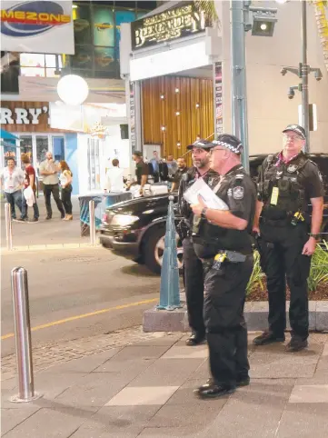  ??  ?? There’s more police than patrons in downtown Surfers Paradise and it is our civic duty to provide these officers of the law with some company in Games party precincts.