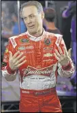  ?? AP ?? In his first year at StewartHaa­s Racing, Kevin Harvick won five races, including the finale, and the title.