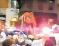  ?? NYPD ?? Video shows a protester atop an NYPD vehicle in May 30 assault at St. Marks and Flatbush Aves. in Brooklyn.