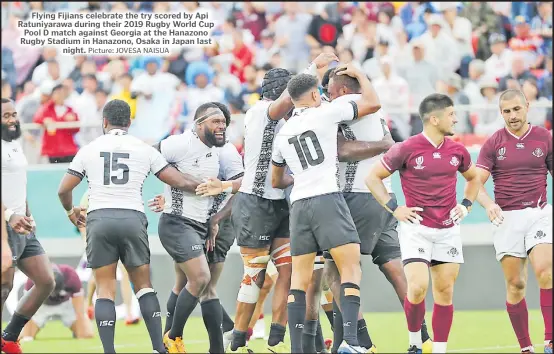  ?? Picture: JOVESA NAISUA ?? Flying Fijians celebrate the try scored by Api Ratuniyara­wa during their 2019 Rugby World Cup Pool D match against Georgia at the Hanazono Rugby Stadium in Hanazono, Osaka in Japan last night.