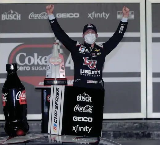  ?? CHRIS GRAYTHEN/GETTY IMAGES ?? William Byron celebrates in Victory Lane after winning the NASCAR Cup Series Coke Zero Sugar 400 at Daytona Internatio­nal Speedway.