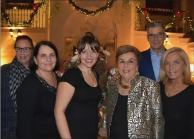  ??  ?? Shelley Casciato and her husband, Bob, far right, of Malvern; Karen Casciato Adams and Lauren Adams, of Chester Springs; Maryann Casciato, of Rosemont; and Mimi Casciato Koelle, of Malvern, show their support at the Guadalupe Guild fundraiser.