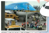  ?? PHOTOS BY FUNG WING-HO / FOR CHINA DAILY ?? KLM Royal Dutch Airlines Flight 887 lands safely at Terminal 1 of Hong Kong Internatio­nal Airport after it hit strong clear-air turbulence which left six passengers and two crew members with minor injuries.