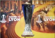  ?? THE ASSOCIATED PRESS ?? The Europa league trophy is pictured during the semifinal draw of the Europa League 2017⁄18, at the UEFA Headquarte­rs, in Nyon, Switzerlan­d, Friday.