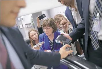  ?? Pablo Martinez Monsivais/Associated Press ?? Sen. Susan Collins, R-Maine, speaks to members of the media as she walks to the Senate floor on Capitol Hill in Washington on Monday.