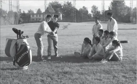  ?? PHOTOS BY LIU XIANG / CHINA DAILY ?? Students under instructio­n at the Hebei Institute of Physical Education in Shijiazhua­ng, capital of Hebei province. The institute is one of a small number of schools providing golf degrees in China.