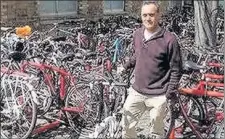  ??  ?? n WILL IT TAKE OFF: Cycle officer Ali Jafarey is promoting the bike, but one staff member has said ‘treacherou­s roads’ are a deterrent