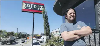  ?? ADRIAN LAM, TIMES COLONIST ?? Nick Crooks, owner of Saltchuck Pies on Bay Street, in front of his eatery and the constructi­on zone near the Port Ellice Bridge.